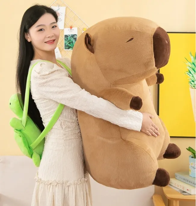 Capybara felpa con mochila de tortuga simulación Capibara Anime muñeca esponjosa lindo Capybara niños juguete de peluche