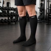 Chaussettes de compression pour la récupération sportive des jeunes, commande en gros, logo personnalisé, respirantes, hauteur genou, en coton, pour cyclisme, club de football, gym