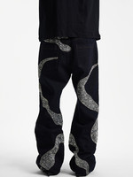 Jean en denim noir pour homme, coupe large, style streetwear, avec patchwork ondulé à sequins argentés, coupe droite et ample