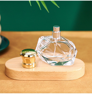 Elegante <span class=keywords><strong>Alien</strong></span> <span class=keywords><strong>Perfume</strong></span> Botellas de vidrio 30ml 50ml 100mL Diseño irregular con aleación Tapa de zinc Bomba Pulverizador OEM Embalaje personalizable - Product Image 4