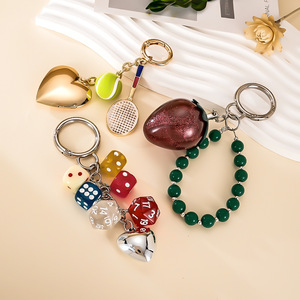 Lindo Set de Llaveros Novedosos con Dijes de Fresa, Tenis, Dados y Corazón, Perfecto para Decoración de Bolsos y Regalos - Product Image 2
