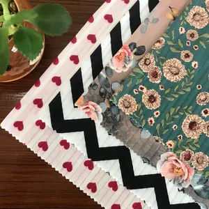 Tissu côtelé élastique en polyester spandex à motif floral imprimé de fleurs colorées personnalisées pour vêtement