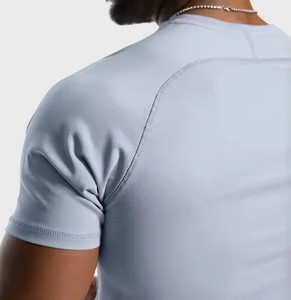 Camiseta deportiva con dobladillo curvo de LICRA de nailon de calidad superior para hombre, ropa de calle, culturismo, Fitness, camiseta ajustada musculosa - Product Image 6