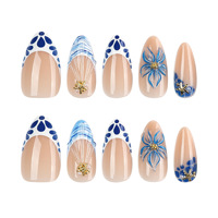 Faux ongles en PMMA style estival bord de mer, faits à la main, forme amande, à presser, avec pointes françaises, décorations peintes à la main de fleurs, étoiles de mer métalliques et perles