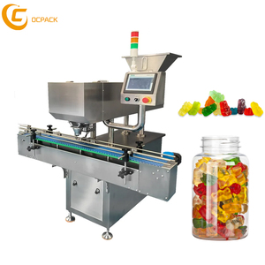 Machine automatique de pesage, de remplissage et d'emballage de bonbons gélifiés en bouteille ou en pot - Product Image 1