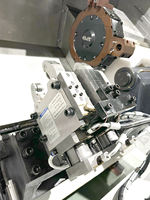 Centre de tournage CNC Fanuc DL TCK65 à banc incliné, mono-broche, moyen portance, avec chargeur de barres pour l'usinage des métaux