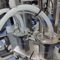 Machine de remplissage de parfum de type mandrin automatique de contrôle de PLC, entraînement de servomoteur sans mousse sans goutte avec écran tactile