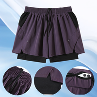 Usine directe taille haute hommes Shorts de course respirant tissu à séchage rapide avec poche pour téléphone été côté fendu motif imprimé