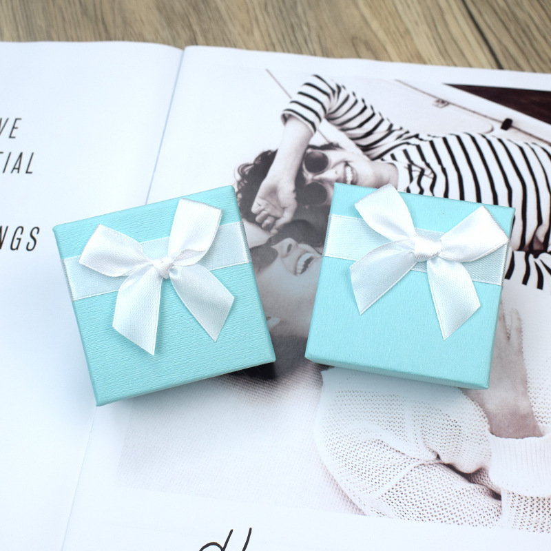 Blue box with white ribbon