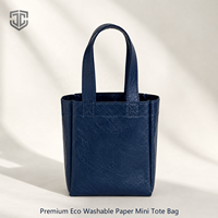 Sac fourre-tout en papier mini personnalisé avec logo sérigraphié, poignée longue, lavable, écologique, réutilisable, pochette cadeau pour exposition, OEM, faible MOQ