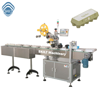 Machine d'étiquetage SKILT pour cartons d'œufs, barquettes de boulangerie, contenants à clapet, barquettes en plastique, impression de la date d'expiration