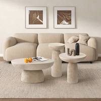 Ensemble de table basse et table d'appoint rondes minimalistes avec finition en travertin pour appartement
