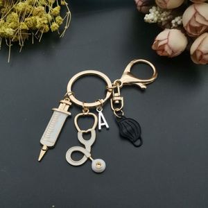 Llavero con letras del alfabeto, herramienta médica, estetoscopio, jeringa, llaveros faciales, recuerdo, regalo del Día de la enfermera, llaveros de enfermera - Product Image 5