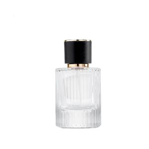 In Stock Luxury 30ml 50ml Bayonet Vertical Grain <strong>Perfume</strong> <strong>Spray</strong> Glass <strong>Bottle</strong> with Black Cap <strong>Perfume</strong> <strong>Bottle</strong> and Packaging - Product Image 1