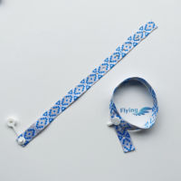 Bracelets en tissu de festival personnalisés en usine bracelet en tissu brodé tissé jacquard bracelet en textile d'événement avec fermoir