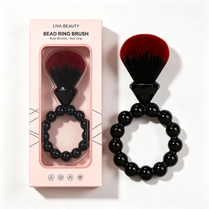 Pinceau de maquillage Kabuki portable avec manche bracelet à dégradé ombré et poils véganes pour l'application de poudre - Product Image 1