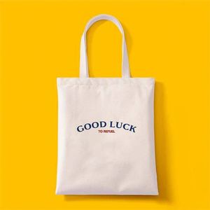 กระเป๋าผ้าแคนวาสธรรมชาติสำหรับใส่หนังสือเรียนหรือช้อปปิ้ง  ทำจากผ้าฝ้ายออร์แกนิค  สามารถนำกลับมาใช้ใหม่ได้  พร้อมบริการพิมพ์โลโก้ตามแบบที่ลูกค้าต้องการ - Product Image 6