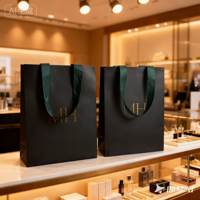 Sacs à provisions vert foncé de luxe personnalisés avec logo "MH" en feuille d'or et poignées en ruban vert émeraude profond de haute qualité