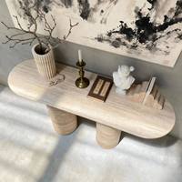 Table console ovale en marbre travertin beige et blanc, style nordique luxueux, pour salon, villa, hôtel, décoration intérieure.