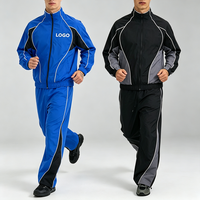 Ensemble de survêtement décontracté 2 pièces pour homme avec logo personnalisé, blocs de couleur, rayures, fermeture éclair intégrale, col montant et pantalon large style streetwear
