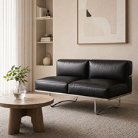 Canapé en cuir moderne de style nordique pour salon, chaise à dossier confortable pour usage domestique, banc de salon luxueux en cuir.