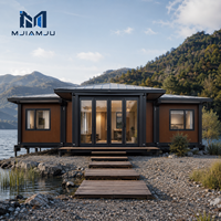 Maison conteneur préfabriquée mobile modulaire démontable de luxe au design artisanal moderne, extensible, à double aile et mur en verre, compacte