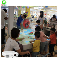 Table de jeu interactive de projection de sable cinétique magique multijoueur pour aire de jeux, centre commercial, enfants