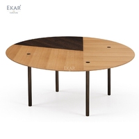 Table à manger ronde de luxe moderne, surface bordeaux avec incrustation veinée noire, base sur piédestal pour villa