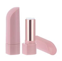 Tube de baume à lèvres magnétique en forme de pouce en ABS rose mat pour cosmétiques matériau d'emballage plat