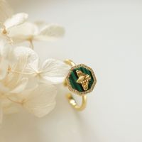 Style japonais S925 argent plaqué or Malachite petite abeille ouverte pour les femmes à la mode Niche Design Vintage Palace Tail Anniversary