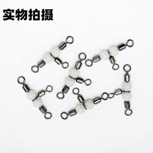 ตัวเชื่อมต่อแบบหมุนสำหรับตกปลาในน้ำเค็มขนาด 1-5/16 นิ้ว รุ่น Figure Eight Luminous Splitter พร้อมลูกปัดสีขาวและแกนทองแดง - Product Image 3