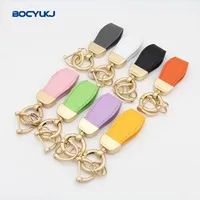 Porte-clés de voiture en cuir avec logo métallique pour BMW Mercedes VW Audi MINI Hyundai KIA MG Toyota Ferrari, accessoires anti-perte