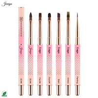 Ensemble de pinceaux à ongles en métal rose avec logo personnalisé découpé, manche creux, poils en nylon pour l'application de vernis gel et la création de motifs d'art sur les ongles
