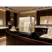 Vitrine de magasin de détail moderne de luxe avec éclairage LED, en acier inoxydable, sur mesure, professionnelle, suspendue