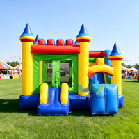Château gonflable commercial combiné avec deux toboggans secs, en PVC robuste, pour location événementielle et aires de jeux