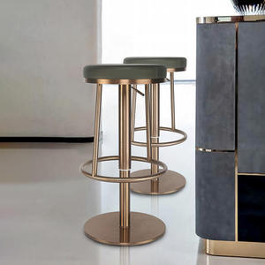 Restaurants and hotels feature modern rose gold stainless steel bar <b>stools</b> with swivel bases and <b>height</b>-<b>adjustable</b> ottoman legs - Product Image 1