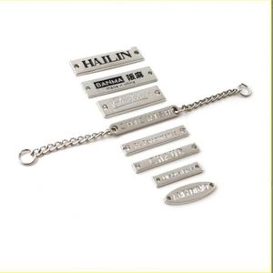 Custom Metal Clothing Logo <b>Sewing</b> Tag Small Letter Labels Zinc Alloy Tag Metal Brand Logo Label for Mens Clothing - Product Image 3