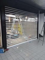 Porte pliante électrique en polycarbonate transparent, volet roulant pour la sécurité des magasins commerciaux, vente en gros