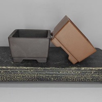 Pot à bonsaï miniature en argile violette fait main avec un design de pieds en forme de nuage