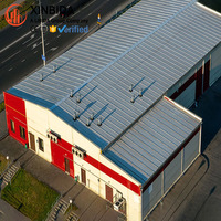 Construction d'entrepôt en acier à grande portée durable, structure portique boulonnée Q355B et homologuée CWB pour le stockage en vrac