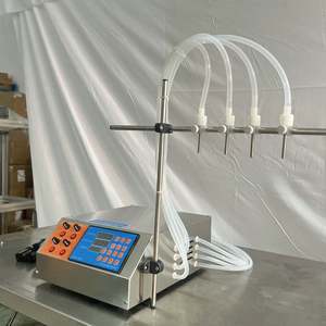 Machine de remplissage de bouteilles en plastique de type table à 4 buses pour produits alcoolisés, shampoings, savons, cosmétiques, boissons, jus d'orange, miel et alcool - Product Image 2