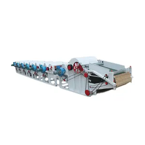 Textile waste recycling machine tears waste denim fabric and opens it into fiber spinning filling fiber recycling line