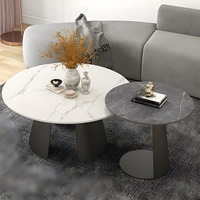 Ensemble de table basse moderne et durable avec un design gain de place, finition noire, cadre en acier et plateau en marbre