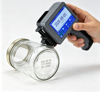 Imprimante jet d'encre portable Yaomatec Mini pour le marquage des bouteilles en verre et des emballages de canettes métalliques