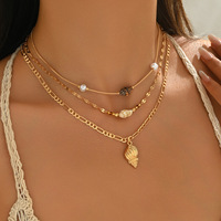 Ensemble de colliers longs à pendentifs multicouches en coquillage et perles dorées, style vacances d'été, minimaliste et luxueux