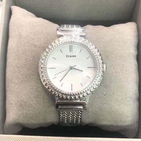 Montre-bracelet de luxe en acier inoxydable, 32 mm, cadran au design simple, montre à quartz dorée tendance pour femme, vente en gros, faible MOQ