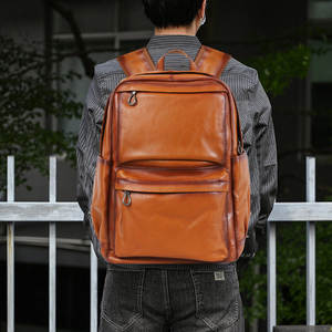 Sac à dos de voyage personnalisé en cuir de vache pleine fleur 100% étanche avec USB et fermeture à glissière fabriqué par Best Backpack Maker - Product Image 1