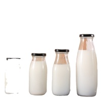 Bouteille en verre isolée réutilisable de grande capacité pour le lait, le jus, le thé avec impression sérigraphique et bouchon à vis