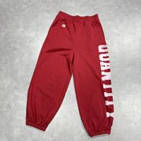Pantalon de jogging rouge vintage imprimé effet vieilli pour homme, taille élastique, coupe oversize ample, style streetwear décontracté avec motif graphique