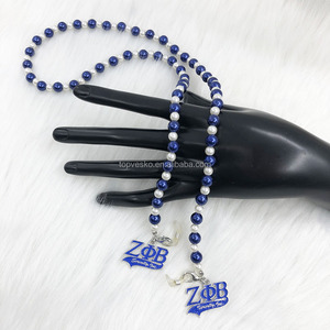 Fait à la main sororité grecque Zeta Phi Beta blanc bleu perle lettre breloques <span class=keywords><strong>lunettes</strong></span> <span class=keywords><strong>de</strong></span> soleil <span class=keywords><strong>lunettes</strong></span> <span class=keywords><strong>de</strong></span> lecture chaîne porte-<span class=keywords><strong>cordon</strong></span> - Product Image 1